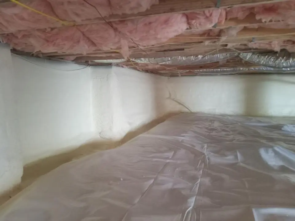 Crawl space encapsulation with closed-cell spray foam for Commercial Roof Restoration in Allen